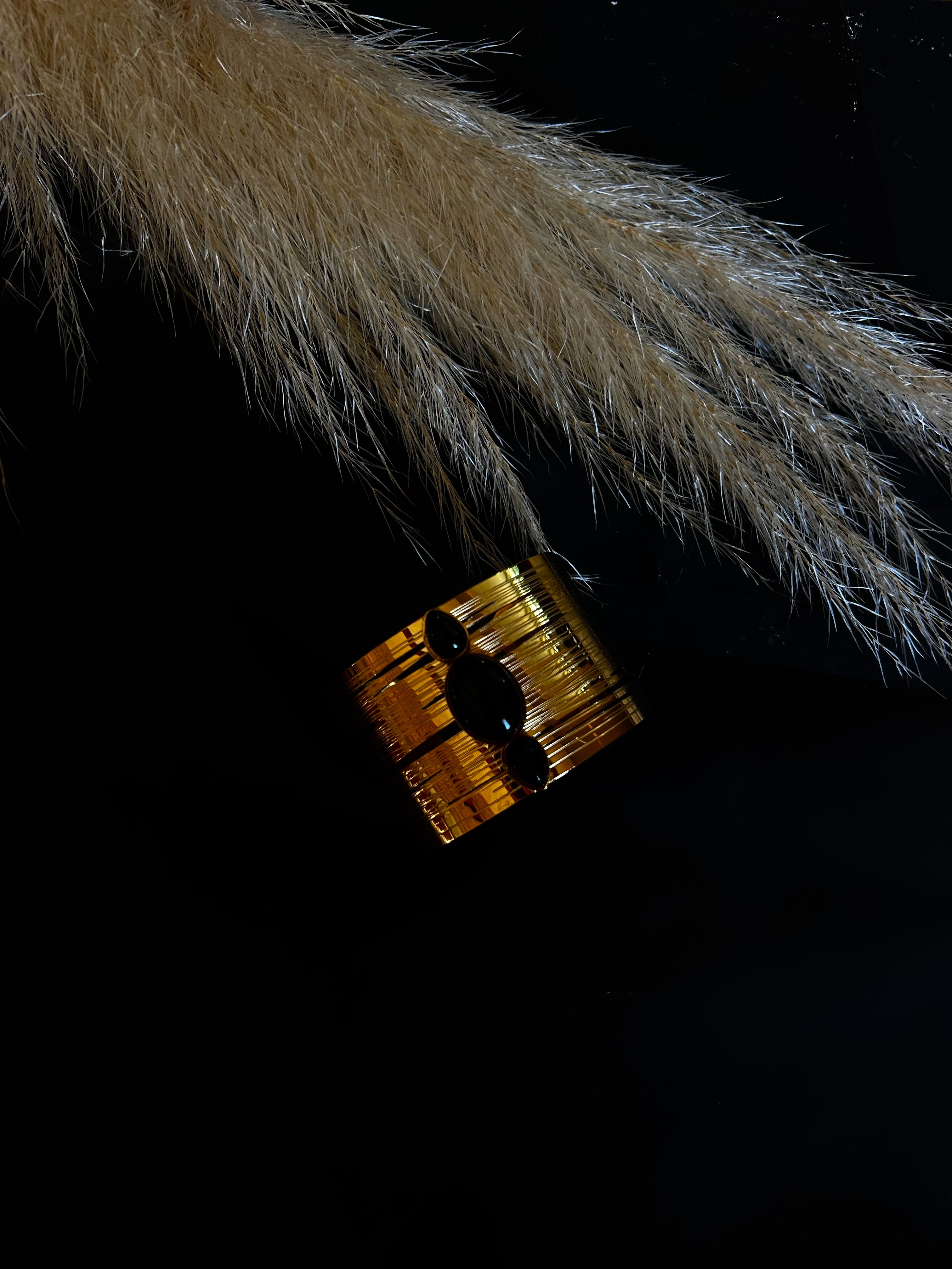 Manchette pierre noir