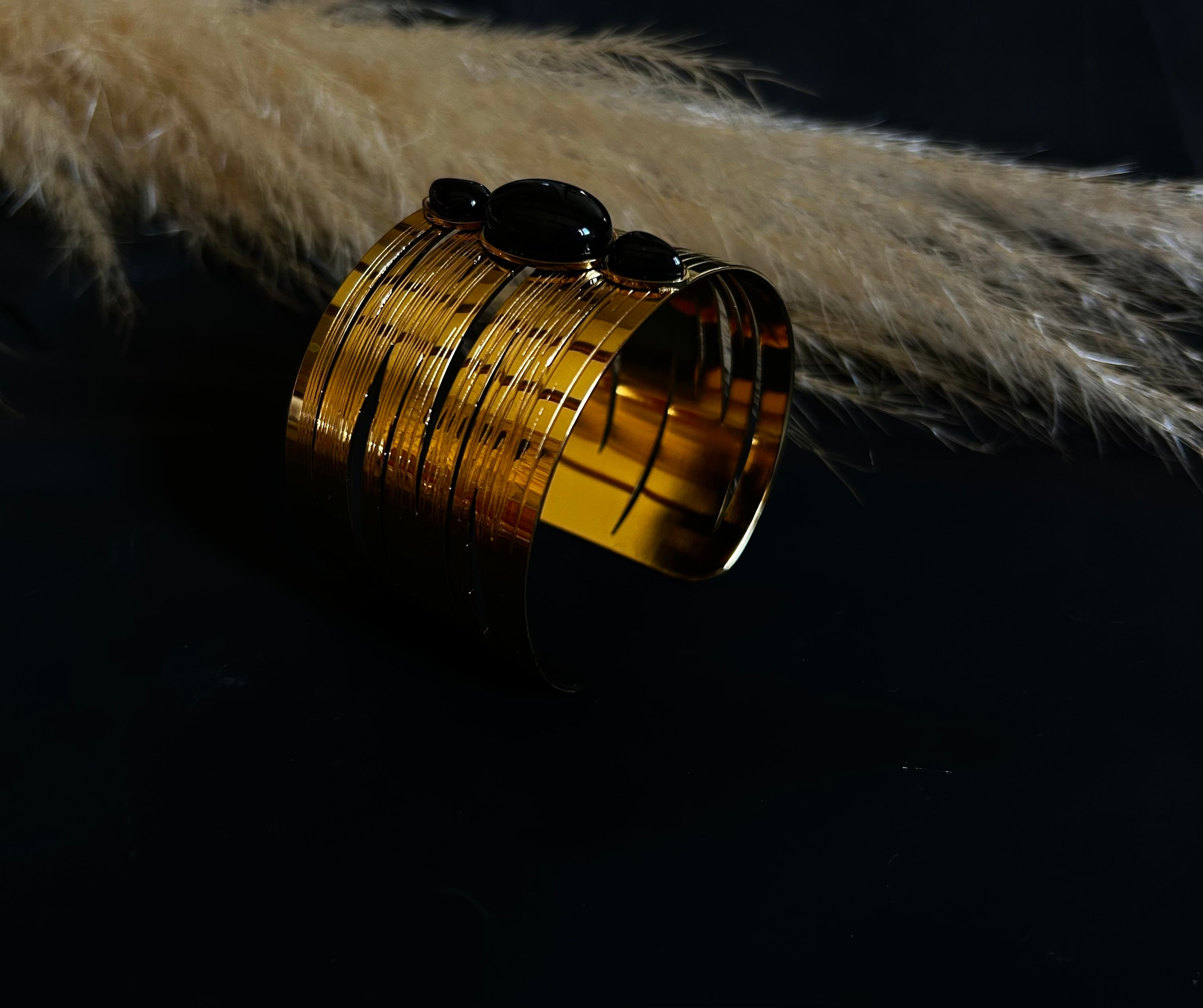 Manchette pierre noir